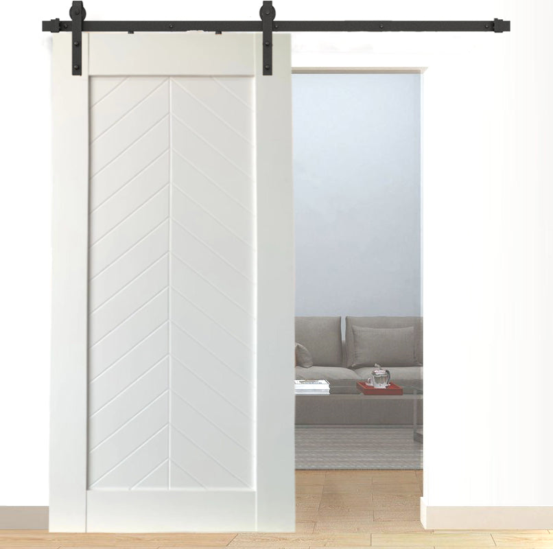 A sliding barn door used as a partition for the living room