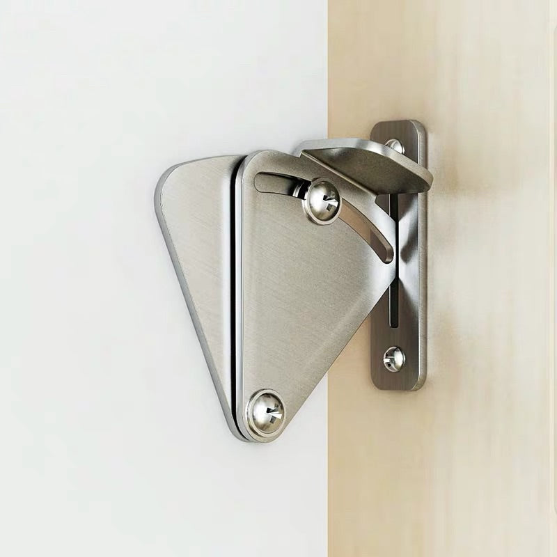 Silver flip latch used on sliding barn doors
